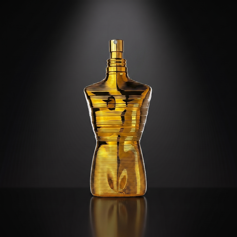 Jean Paul Gaultier Le Male Elixir Absolu — frasco sobre superficie negra reflectante con fondo carbón