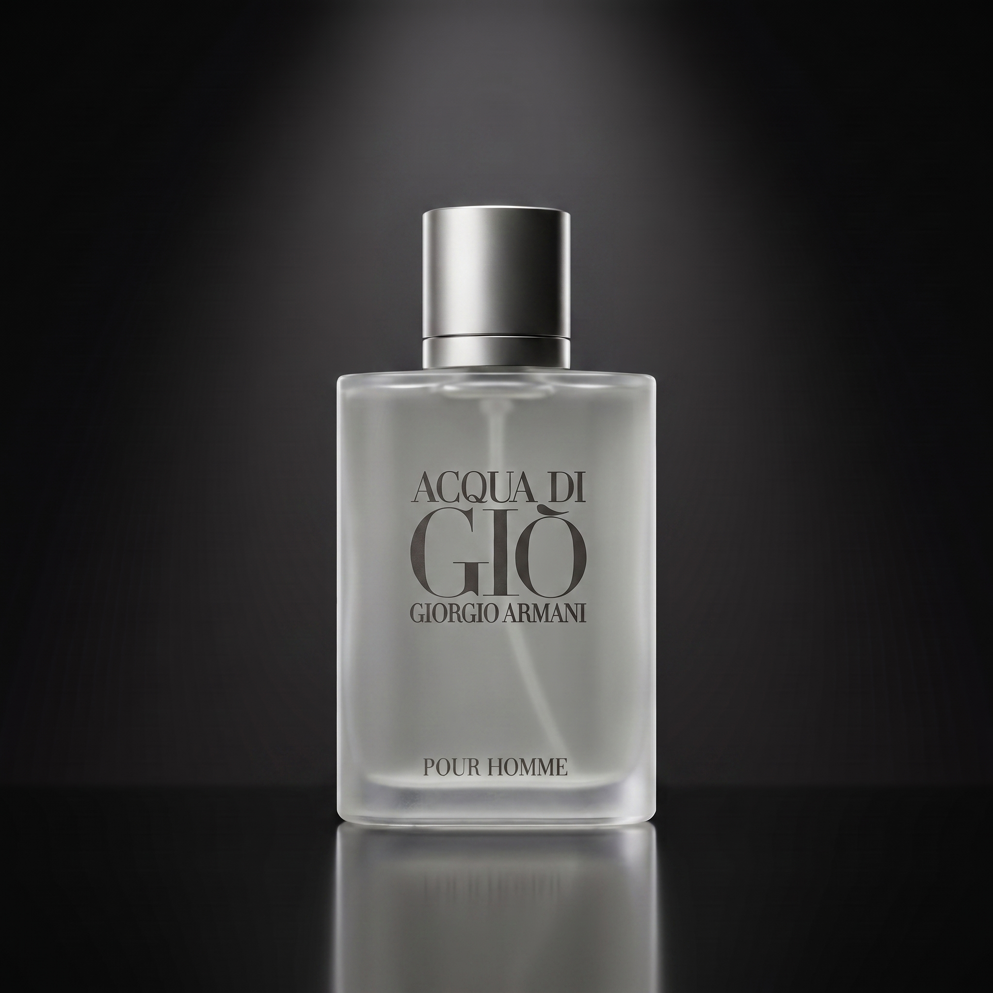 Giorgio Armani Acqua di Giò — frasco sobre superficie negra reflectante con fondo carbón